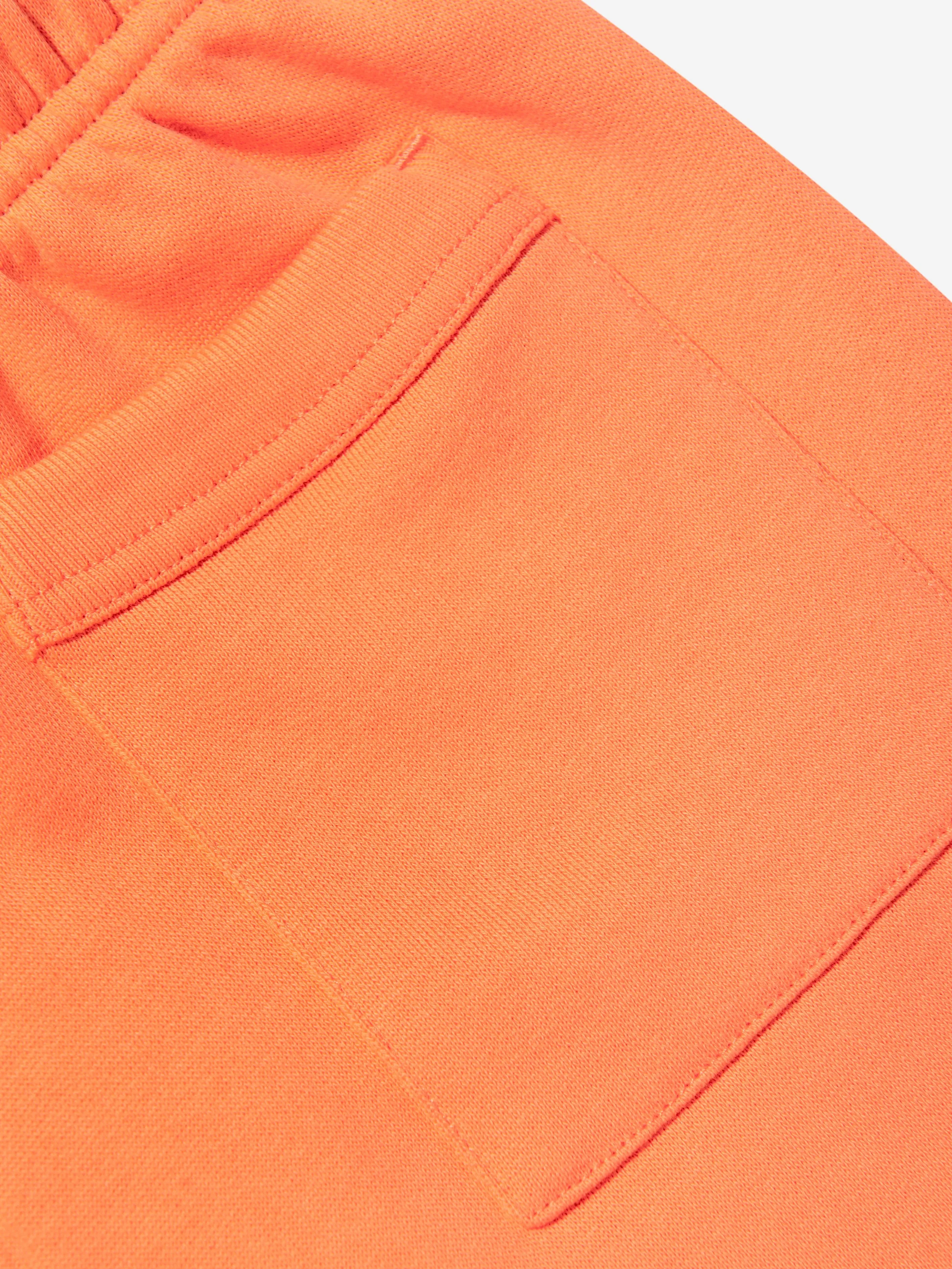 Acne Studios Kinder Logo Joggerhose in Orange