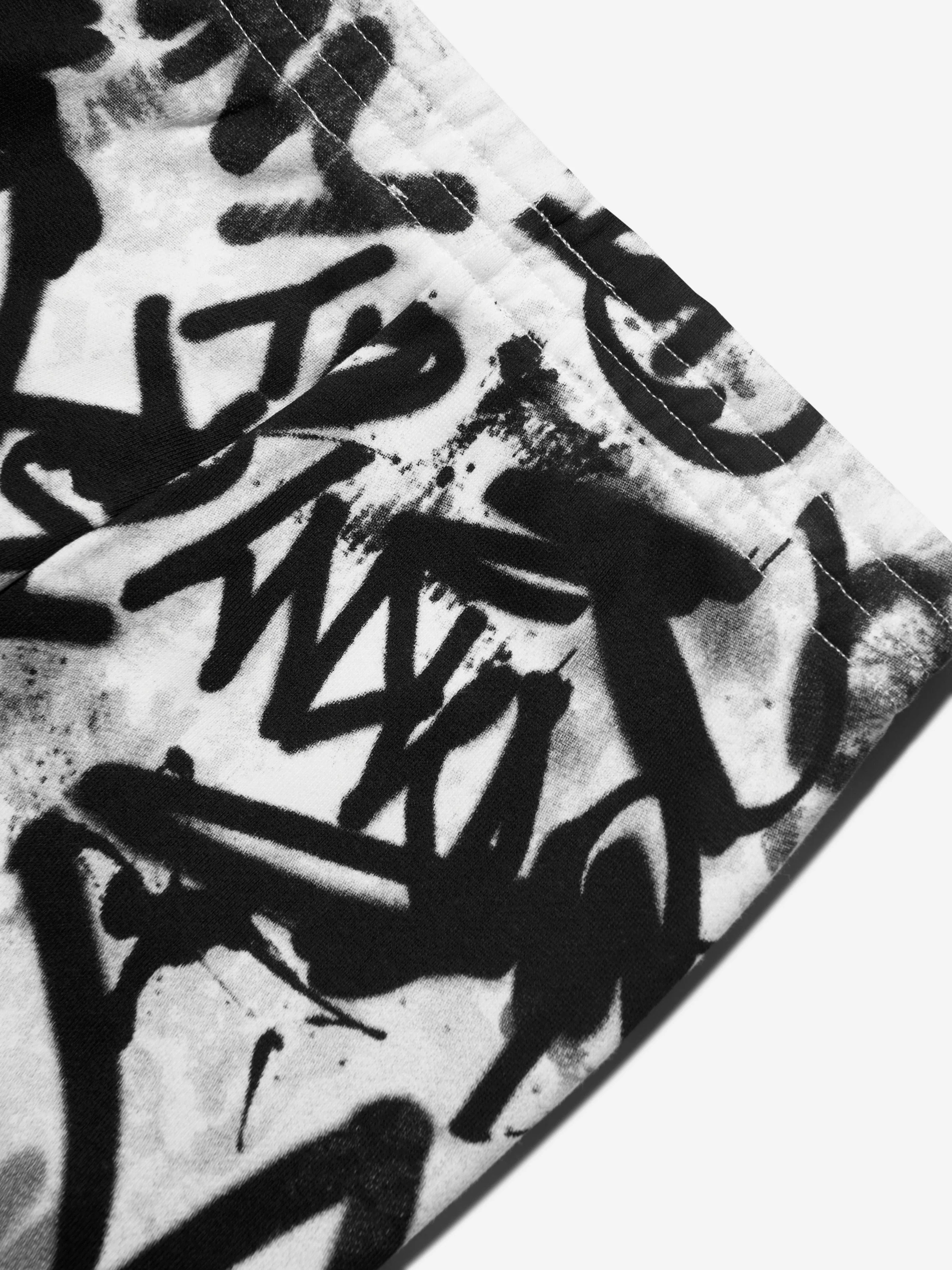 DKNY Boys Graffiti-Print Jogginghose in Weiß