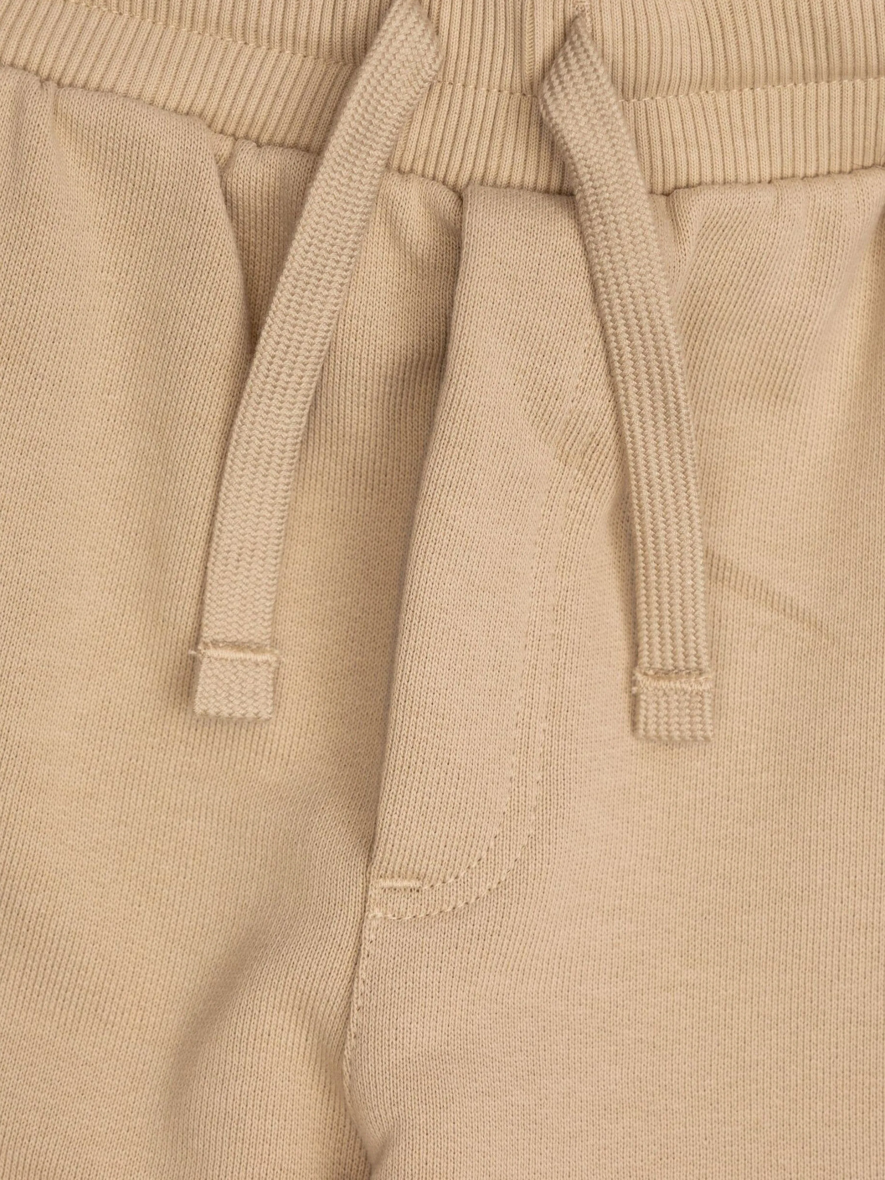 Dolce & Gabbana Jogginghose für Jungen mit Logo in Beige